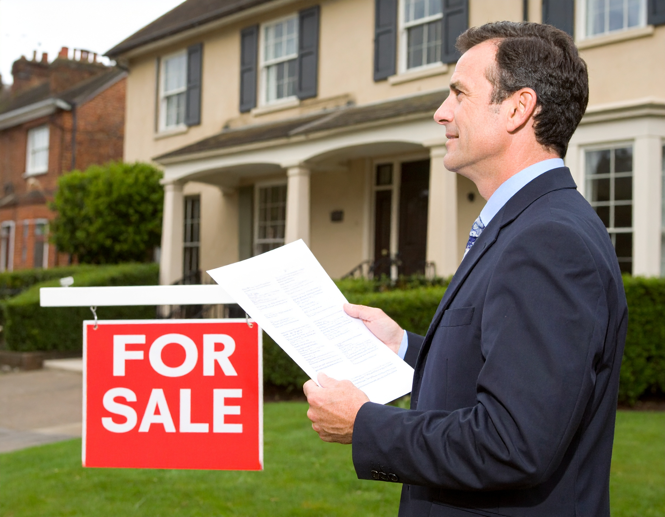 Surge in Property Down Valuations Wipes Millions from Stagnant UK Housing Market